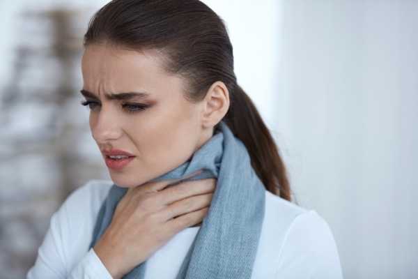 Woman Having a Sore Throat